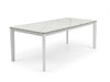 Rivoli Dining Table with powder-coated steel base and Spanish ceramic top