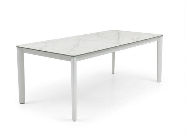 Rivoli Dining Table with powder-coated steel base and Spanish ceramic top