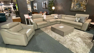 Roxburgh corner sofa with single recliner in beige leather on clearance sale displayed in showroom