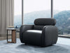 Sequence Leather Armchair in modern living room setting with mountain view.