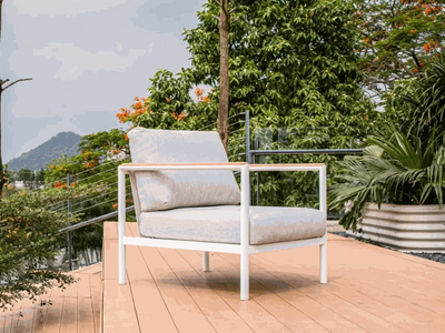 Sierra Outdoor Lounge - 1 Seater Sofa with aluminum frame and teak arm trim on a deck.
