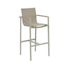 Sierra Outdoor Sling Bar Chair with sand powder-coated aluminium frame, nutmeg French Batyline sling fabric, and teak armrest trim.
