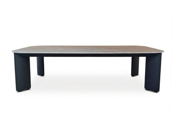 Sierra Outdoor Ceramic Coffee Table with a charcoal aluminum frame and brown wood-look ceramic top, rounded edges