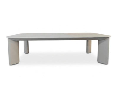 Sierra Outdoor Ceramic Coffee Table with a sand-coloured aluminum frame and pale travertine ceramic top, four legs