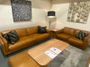 Sunrise Leather Lounge Suite clearance sale caramel leather 2.5 and 2 seater sofas with black cushions and wooden coffee table