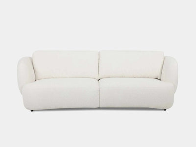 Sussex 3.5 Seater Curved Sofa in light fabric with soft rounded edges and deep cushioned seating