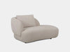 Sussex Chaise Lounge sofa in soft beige fabric with curved sculptural design and deep cushioning