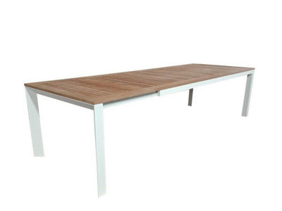 Extendable teak dining table with white aluminum frame, Tahini Outdoor design.