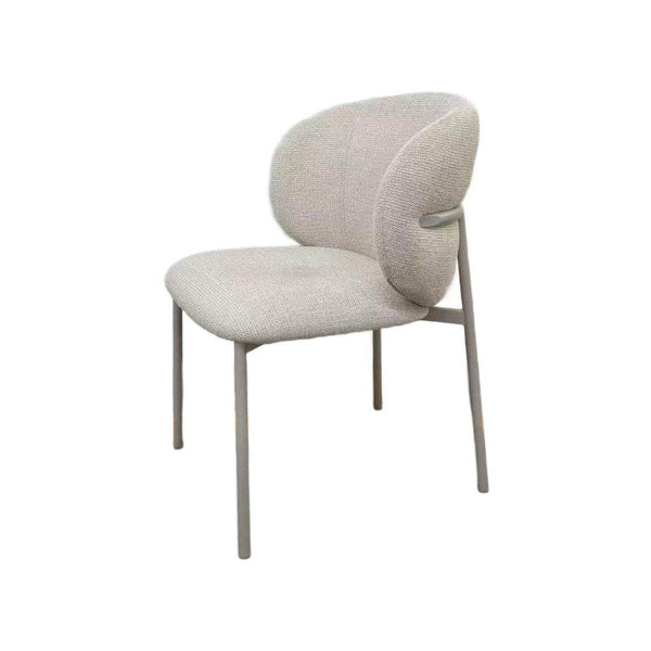 Theo Dining Chair with matte grey steel frame and ecru fabric upholstery in a modern dining room