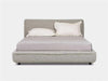 Todd Bed Frame with soft curves, upholstered silhouette, and low-profile design in a contemporary bedroom setting.