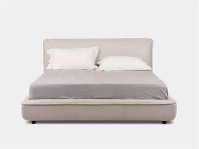 Todd Bed Frame in premium fabric with curved edges and upholstered design, showcasing a modern and minimalistic style.