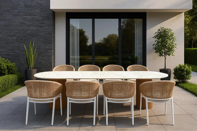 Toledo Ceramic Outdoor Dining Table with oval ceramic top and teak cylindrical legs in a modern outdoor patio setting