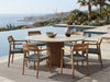 Toledo Teak & Ceramic Round Dining Table styled in a poolside dining setting