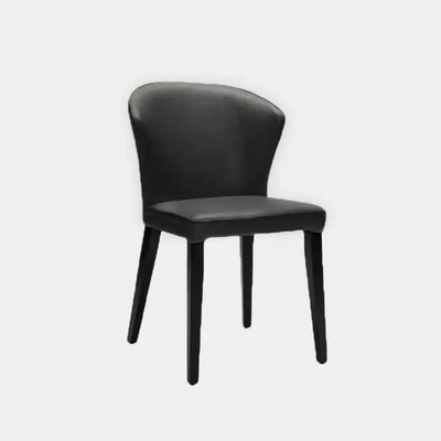 Tulip Leather Dining Chair with premium top-grain leather upholstery and ergonomic design for comfort and style.