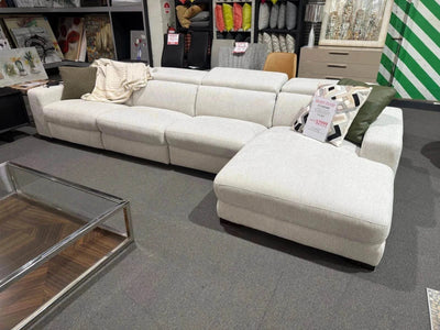 Light gray Tusmore chaise lounge with electric recliner on clearance sale in showroom