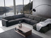 Tusmore 6.5-Seater Corner Sofa with Recliner and Chaise in a modern living room setting.