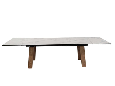 Valencia Twin Extendable Dining Table with tempered glass ceramic top, veneered MDF legs, and powder-coated steel frame in modern design