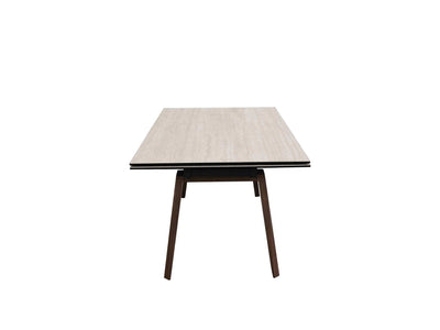 Valencia Twin Extendable Dining Table with tempered glass and ceramic top, powder-coated steel frame, and veneered MDF legs.