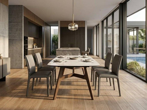 Warwick Extendable Dining Table with a pale marble-patterned rectangular top, warm wood legs and a central extension seam.