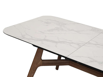 Warwick Extendable Dining Table with marble ceramic top, ash veneer legs, and powder-coated steel frame in modern dining room