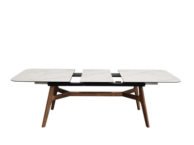 Warwick Extendable Dining Table with marble ceramic top, ash veneer legs, and powder-coated steel frame in modern dining room