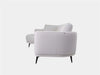 Willow 2.5 Seater Curved Chaise Sofa with slender armrests and tapered legs in light grey fabric.